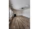 Spacious living room with hardwood flooring, modern ceiling fan, and cozy fireplace at 11538 Ardrey Crest Dr, Charlotte, NC 28277