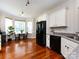 Spacious kitchen with stainless steel appliances and adjacent breakfast nook area at 12928 Windy Lea Ln, Huntersville, NC 28078