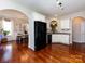 Spacious kitchen with stainless steel appliances, granite countertops, and hardwood floors at 12928 Windy Lea Ln, Huntersville, NC 28078