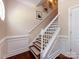 Staircase with white railing and carpet runner detail, leading to the upper level of the home at 12928 Windy Lea Ln, Huntersville, NC 28078