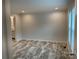 Bedroom featuring neutral walls and wood-look flooring at 130 Zircon Dr, Statesville, NC 28625