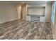 Open living room with built-in shelves and modern flooring at 130 Zircon Dr, Statesville, NC 28625