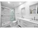 Modern bathroom features a tiled walk-in shower and double sink vanity at 1315 East Blvd, Charlotte, NC 28203