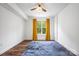 Bedroom offers hardwood floors, natural light, and a ceiling fan at 1315 East Blvd, Charlotte, NC 28203
