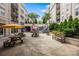 Picturesque courtyard with picnic tables, benches, and a serene waterfall feature at 1315 East Blvd, Charlotte, NC 28203