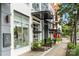Attractive storefront featuring Genevieve & Co. with manicured landscaping and street access at 1315 East Blvd, Charlotte, NC 28203