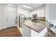 Well-equipped kitchen with granite countertops, stainless steel appliances, and functional layout at 1315 East Blvd, Charlotte, NC 28203