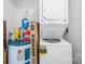 Efficient laundry area features a stacked washer and dryer unit with space-saving design and essential utilities at 1315 East Blvd, Charlotte, NC 28203