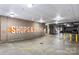 Shops & Dining sign in a well-lit parking garage with visible parking spaces and access points at 1315 East Blvd, Charlotte, NC 28203
