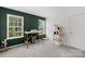 Bright bedroom with a desk next to two windows and a modern cat tree at 132 Sycamore Crossing Ct, Locust, NC 28097
