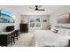 Bright bedroom features neutral tones, ceiling fan, and a window providing natural light at 132 Sycamore Crossing Ct, Locust, NC 28097