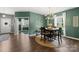 Elegant dining room with a modern chandelier and easy access to the foyer, office and the living room at 132 Sycamore Crossing Ct, Locust, NC 28097