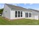 This home features an outdoor patio and green grass in the backyard space at 1471 River Bend Blvd, Indian Land, SC 29707