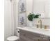 Bathroom with gray vanity, quartz countertops, and gold hardware at 1471 River Bend Blvd, Indian Land, SC 29707