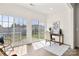 Bright sun room with sliding glass doors leading to the back yard, perfect for office space at 1471 River Bend Blvd, Indian Land, SC 29707