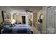 Comfortable bedroom with a bed, dresser and nightstands at 1902 Stonewyck Ave, Kannapolis, NC 28081
