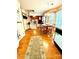 Inviting eat-in kitchen with warm wood flooring, ample natural light, and views into the adjacent living spaces at 1902 Stonewyck Ave, Kannapolis, NC 28081
