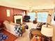 Cozy living room with fireplace, comfortable seating, and natural light, ideal for relaxation and entertainment at 1902 Stonewyck Ave, Kannapolis, NC 28081