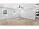This cozy bedroom gets great natural light from two windows and has a ceiling fan at 1933 Tara Trl, Lancaster, SC 29720