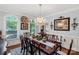 Formal dining room with a chandelier, decorative windows, and elegant decor at 1933 Tara Trl, Lancaster, SC 29720