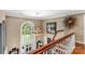 Grand entryway with two-story window, staircase, elegant chandelier, and stylish decor at 1933 Tara Trl, Lancaster, SC 29720