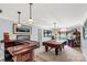 The game room features a pool table, a wet bar, an arcade game and custom lighting at 1933 Tara Trl, Lancaster, SC 29720