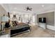 Spacious main bedroom featuring a tray ceiling and seating area at 1933 Tara Trl, Lancaster, SC 29720