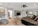 Spacious primary bedroom featuring a stylish decorative wall with tv, and elegant gray color palette at 1933 Tara Trl, Lancaster, SC 29720