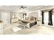 Spacious main bedroom with plush carpet, stylish furniture, and tray ceiling at 1933 Tara Trl, Lancaster, SC 29720