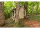 This outbuilding features a porch, a single entry door and a window with an awning at 1933 Tara Trl, Lancaster, SC 29720