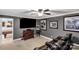 Home theater featuring comfortable seating, large TV, and vintage popcorn machine at 1933 Tara Trl, Lancaster, SC 29720