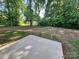 A spacious backyard with mature trees and an abundance of natural light at 219 Pine St, Rockwell, NC 28138