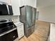 Contemporary kitchen featuring stainless steel appliances and white cabinets at 219 Pine St, Rockwell, NC 28138