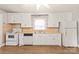 Functional kitchen featuring bright, white cabinets and modern appliances at 2722 Eastway Dr, Charlotte, NC 28205