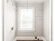 Laundry room with hookups, window, and neutral walls at 2722 Eastway Dr, Charlotte, NC 28205