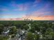Stunning aerial view capturing the Charlotte skyline and surrounding neighborhood at sunset at 2800 Georgia Ave, Charlotte, NC 28205