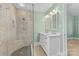 Modern bathroom featuring a walk-in shower with glass enclosure and a double sink vanity at 2800 Georgia Ave, Charlotte, NC 28205
