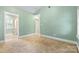 Spacious bedroom features neutral carpet, and en-suite bathroom at 2800 Georgia Ave, Charlotte, NC 28205