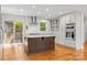 Modern kitchen with stainless steel appliances, island, and a double wall oven at 2800 Georgia Ave, Charlotte, NC 28205