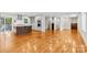 Open concept layout with a spacious living area and wood floors, offering great flow and natural light at 2800 Georgia Ave, Charlotte, NC 28205