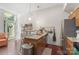 Bright kitchen features granite countertops, stainless steel appliances, and an open design to the living spaces at 297 Mcdonald Ave, Charlotte, NC 28203