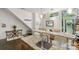 Kitchen showcases granite countertops, stainless steel sink, and an open design to the dining and living spaces at 297 Mcdonald Ave, Charlotte, NC 28203