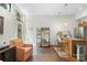 Open-concept space with tall ceilings, natural light, and views of the kitchen and exterior, perfect for entertaining at 297 Mcdonald Ave, Charlotte, NC 28203