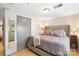 Cozy main bedroom featuring hardwood floors, neutral decor, ample natural light, and a closet at 297 Mcdonald Ave, Charlotte, NC 28203