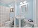 Clean and bright bathroom with a pedestal sink and shower at 3612 Trent St, Charlotte, NC 28209