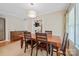 Bright dining room with wood table, and natural light at 3612 Trent St, Charlotte, NC 28209