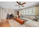 Inviting living room featuring hardwood floors, a large bay window, and a cozy seating area at 3612 Trent St, Charlotte, NC 28209