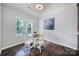 Cozy breakfast nook with natural light, complemented by stylish hardwood floors and modern decor at 3908 Parkers Ferry Rd, Fort Mill, SC 29715