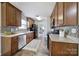 Spacious kitchen featuring modern appliances, ample counter space, and seamless flow to dining area at 3908 Parkers Ferry Rd, Fort Mill, SC 29715