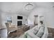 Bright living room featuring a fireplace, vaulted ceilings, and neutral-toned decor at 3908 Parkers Ferry Rd, Fort Mill, SC 29715